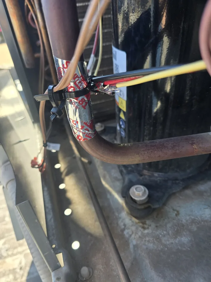 Repairing wiring at the compressor inside a condenser